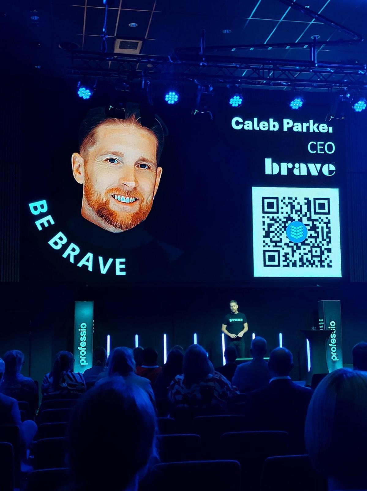 Panel discussion with SpeakerStacks QR code on screen